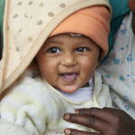 Portrait of an infant at his home in Ethiopia